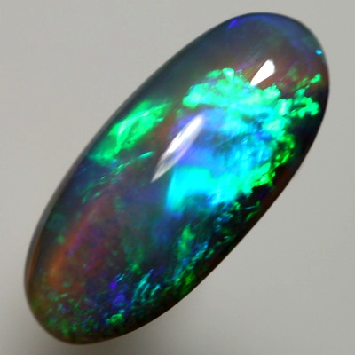 SOLID BLACK CRYSTAL OPAL Very bright turquoise and green over purple